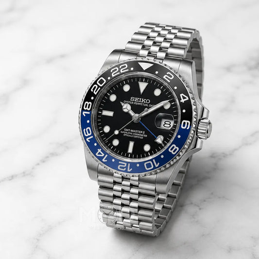Seiko watch with a silver bracelet on a marble background