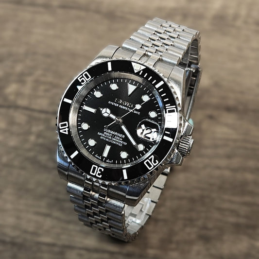 Silver wristwatch with black dial on a wooden surface