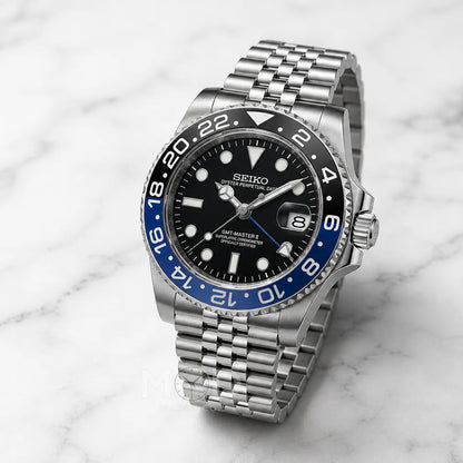 Seiko watch with a silver bracelet on a marble background
