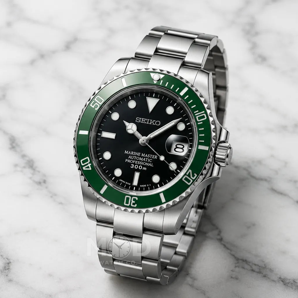 Seiko watch with green bezel and black face on a marble surface