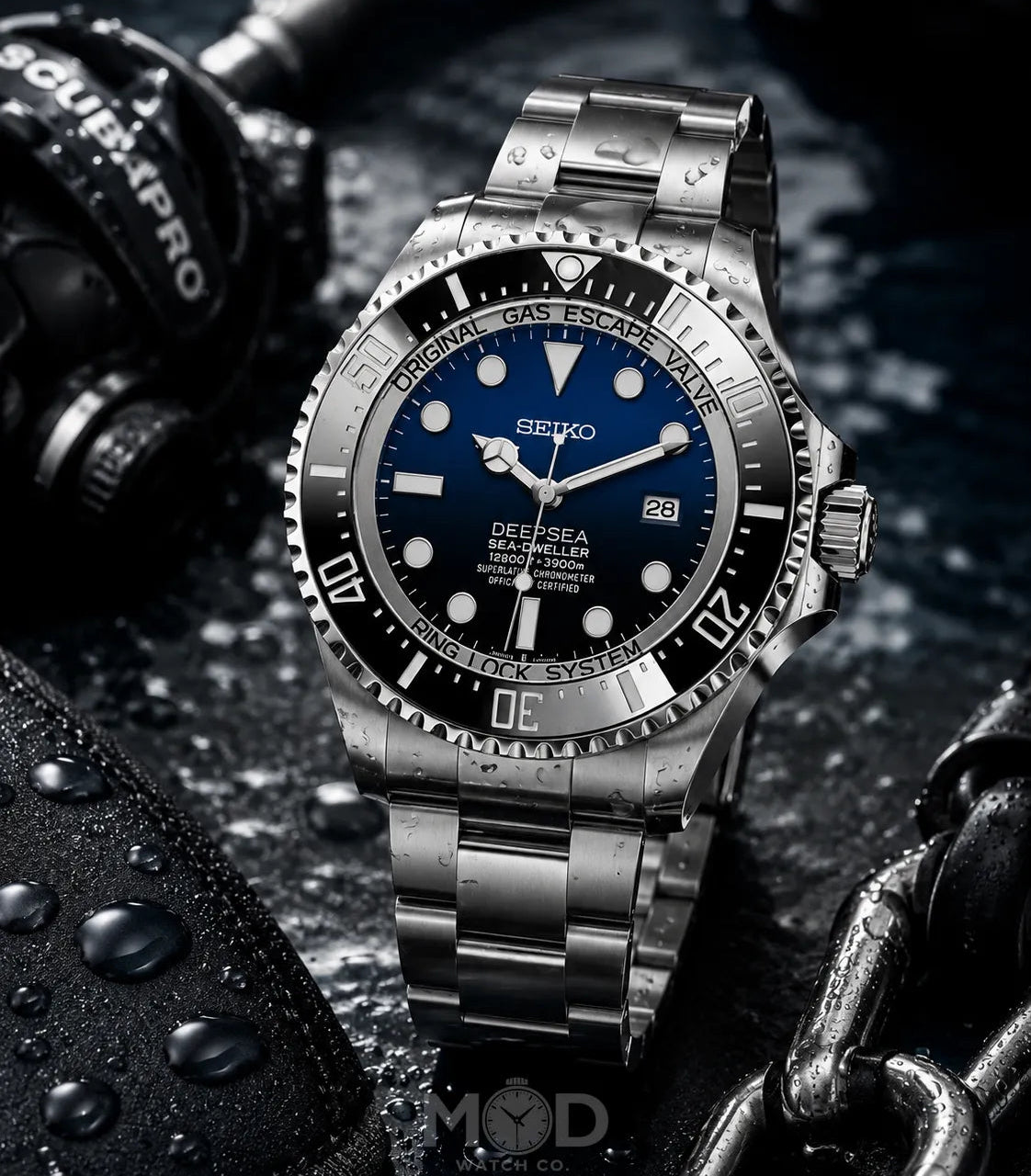 Silver Seiko watch with blue dial on a dark background