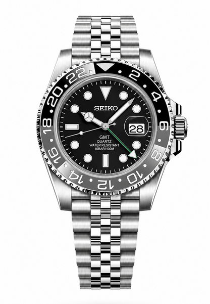 A Seiko GMT Quartz watch with a stainless steel Oyster bracelet, featuring a black dial, black bezel, and silver-tone case and bracelet, shown against a plain white background.