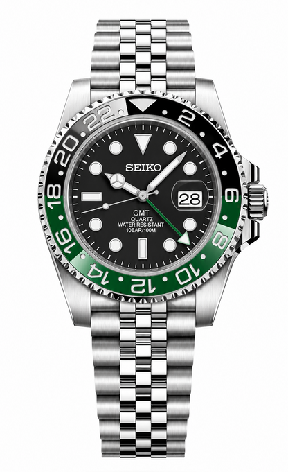 A Seiko GMT watch with a stainless steel Oyster bracelet, featuring a black dial, a green and black bezel, and a date window at 3 o'clock, shown against a plain white background.