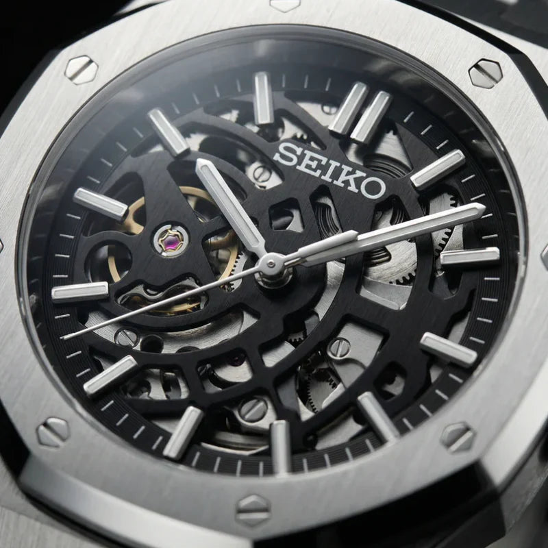 Seiko watch with visible mechanical components on a black background