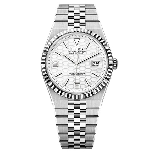 Silver watch with a detailed face on a white background